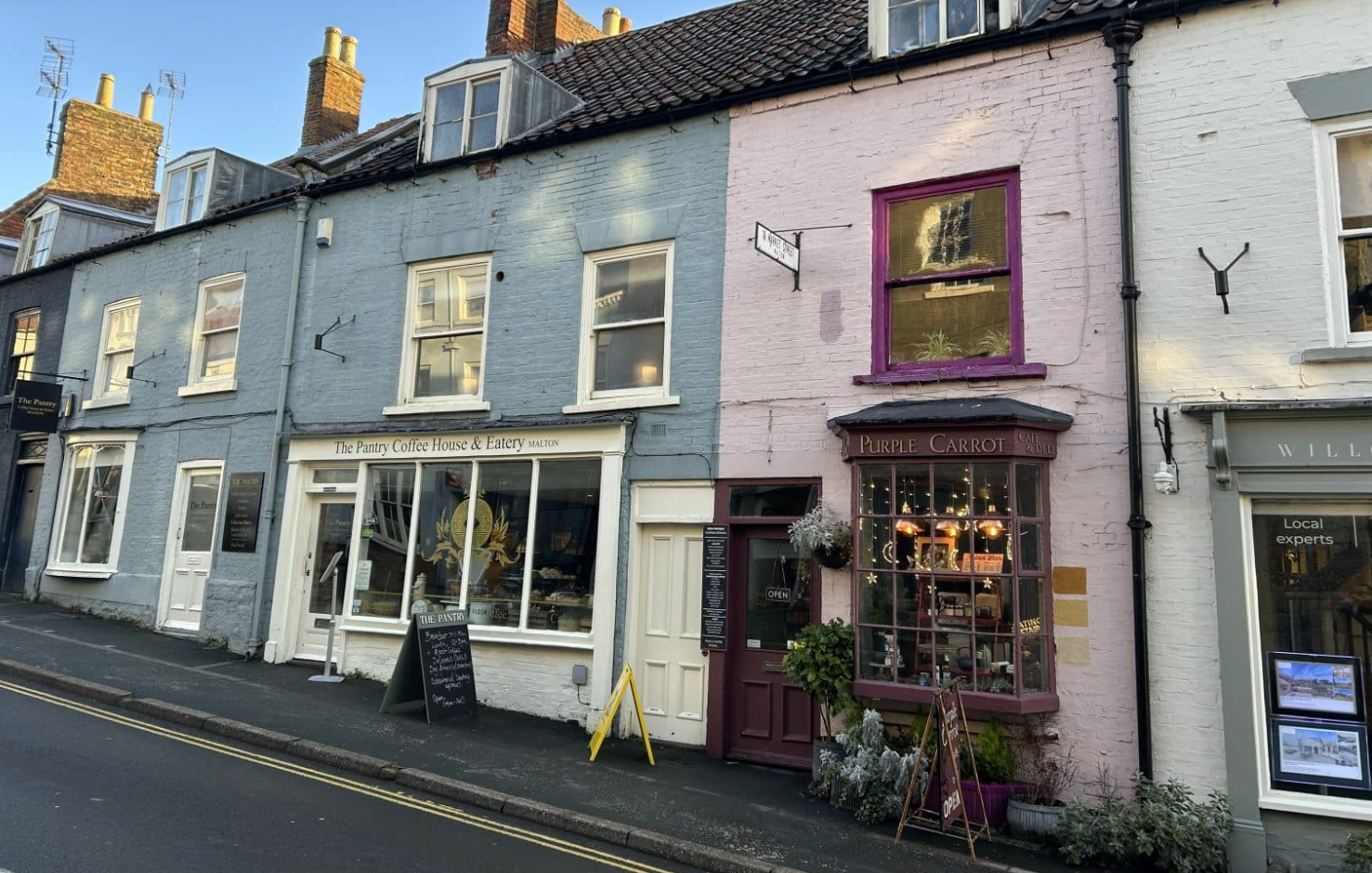 Independent cafe and shop fronts in Malton town centre