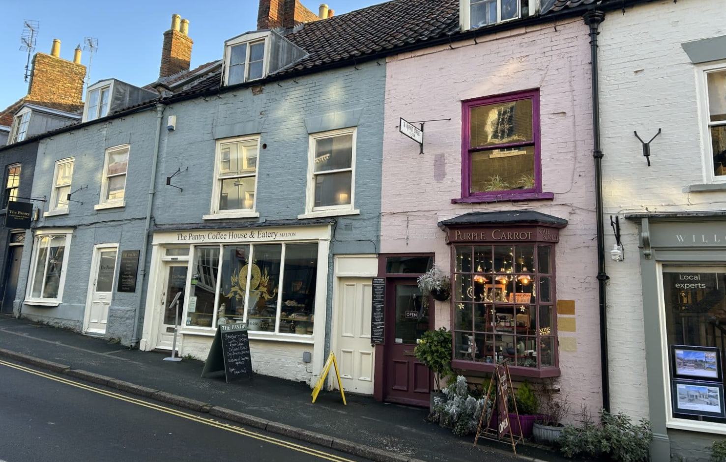 Independent cafe and shop fronts in Malton town centre